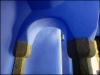 The blue interior of the main porter's lodge at the entrance to Park Güell. Gaudi used a lot of soft curves, spirals and arches in his buildings.