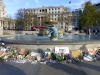 Around the fountain tributes to Paris have been laid